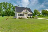 Thanks for touring this home! We hope you will come visit as this could be YOUR next home!  There is a concrete parking pad to park on the right side of the home.