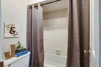 Refreshing ... neutral tile on the shower walls