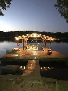 Look at your view at night of the dock! Boat does not go with the property.