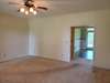 Family/living room looking into the breakfast room that has french doors to the back covered patio!