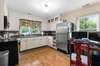 Kitchen with Corian Countertops. Refrigerator does not convey.