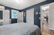 Another view of the primary bedroom showcasing the daring color scheme, closet & en-suite bathroom! 33 San Gabriel Court Old Hickory, TN 37138