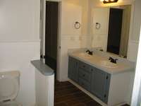 Double vanities from shower