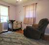 Bedroom 2 with hardwood floors