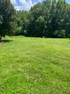 Nice large lot with mature trees and wooded area