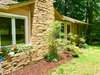 Fresh landscape & stepping with stones to the front door. 