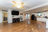 Great Room looking toward the Kitchen. Laminate flooring is all throughout the Great Room/Kitchen area!