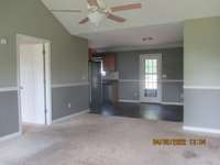 As you enter looking from Living Room to Dining and Kitchen area. 