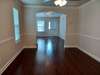 Archway between living and dining room...chair rail around dining room.