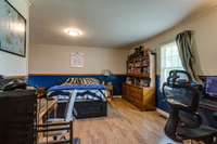Enormous Master Bedroom with tons of natural light and gorgeous wood floors!