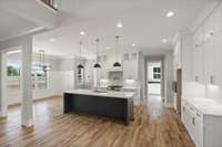 Large kitchen island with matching butler's pantry. 