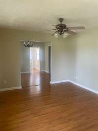 From Living room looking into dining area and utility room