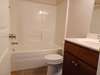 Fantastic soaking tub/shower combo in guest bathroom.