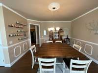 Beautiful formal dining room. Table and chairs can be purchased separately from owner.