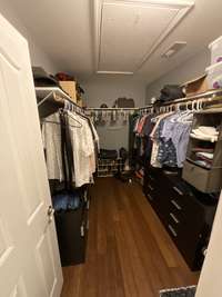 Supersized main bedroom walk-in closet. Attic space above is floored for storage.