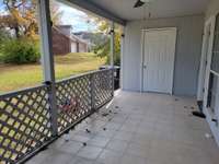 Outdoor Tiled Patio with large Storage Closet!