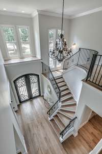 At the top of the staircase on the 2nd level is a gorgeous loft space providing another seating area.