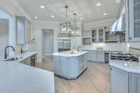 Say hello to your new kitchen!  This space would be a delight to prepare food and gather with family!