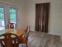 Dinning Room with Access to the Rear Property
