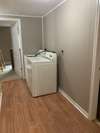 Laundry rm with a storage closet!