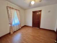 Bedroom with solid wood doors.