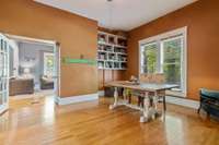 Dining room with French doors. This would make an excellent office space.