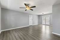 The living area features a ceiling fan and double doors leading outside! 518 Miller Road Smithville, TN 37166