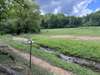 Creek and Partial Fence