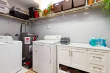 This laundry room is huge.  Plenty of storage! New water heater!