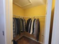 Walk-in closet with attic access.