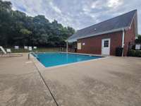 The best pool to have. One you can enjoy and some else takes care of the maintenance. Walking distance from this home.