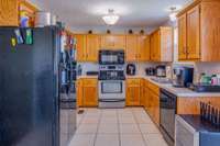 Eat In Kitchen w/ Stainless Steel Appliances, Pantry & Tile Flooring