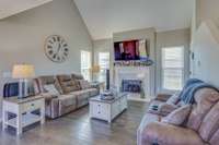 Another View of Living Room w/ Volume Ceilings & Lots of Natural Light