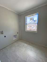 Designated laundry room **Photos are from neighboring unit a little further along**