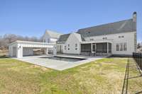 Back View of the Home, Heated (Natural Gas) Saltwater Pool, and Cabana featuring a Full Kitchen