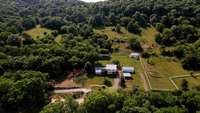 The property and outbuildings truly shine!