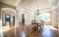 16x12 Dining Room with tons of natural light. Dining room has it’s own covered porch to enjoy before