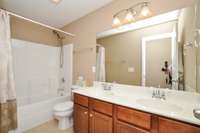 3rd full bath with double vanities