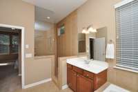 Another view of the luxurious walk-in tile shower!