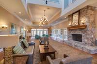 The 10,000 Sq Ft Clubhouse Features a Full Fitness Center, Catering Kitchen, Lobby w/ Cozy Fireplace, & a Billiard Room/Game Room that Overlook the Jr Olympic Pool, Hottub, Children's Pool & Playground