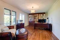 Through the formal living room is a formal dining room (currently being used as a home office). 