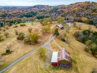 This property is the perfect combination of flat fields, rolling hills, wooded areas and open fields.