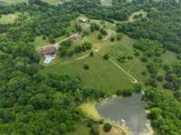 The lake is almost 2 acres and fully stocked for fishing.