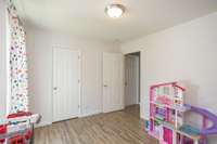 Third bedroom is currently being utilized as a playroom. All bedrooms feature ample closets.