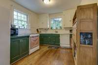 Roomy kitchen with views across the rolling front lawn.