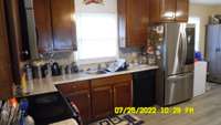 stove, dishwasher, microwave, refrigerator, washer and dryer remain 