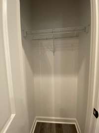 Coat closet   *Photo is from a completed unit with same grade finishes. Same layout.*