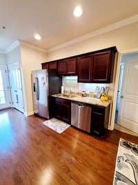 Stainless Kitchen appliances remain  Washer/Dryer as well