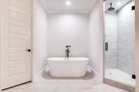 MASTER BATHROOM WITH FREESTANDING TUB, WALK IN SHOWER, DOUBLE VANITIES AND TOILET ROOM