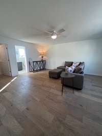 Multi-purpose room upstairs with a closet, full bath and walk-in storage. *previously built home, actual selections and finishes may vary